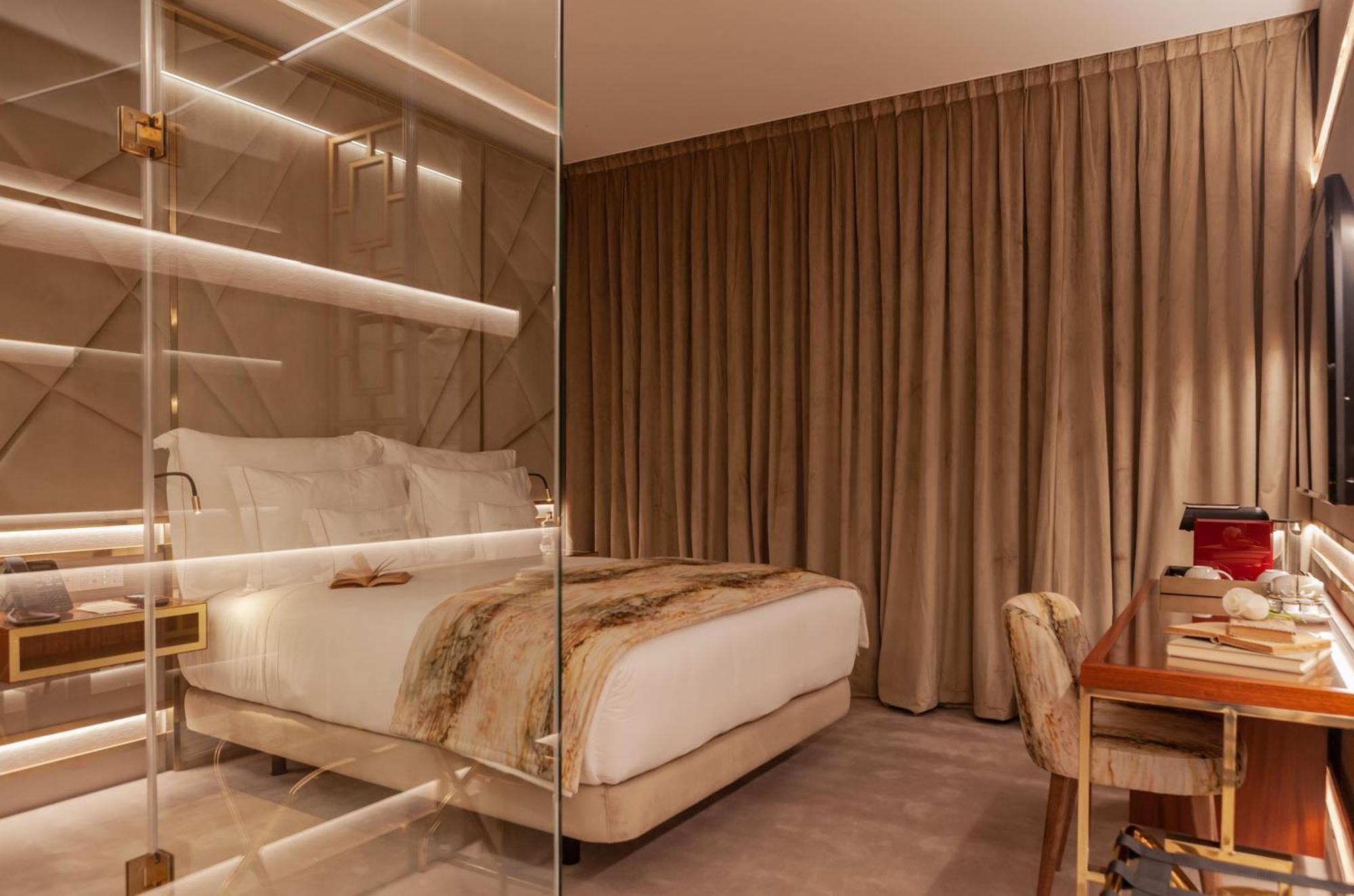 Wine & Books Lisboa Hotel Rom bilde A bedroom at the hotel